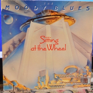 Sitting At The Wheel Image