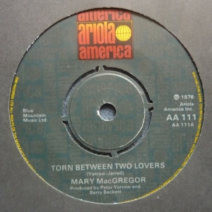 Torn Between Two Lovers Image